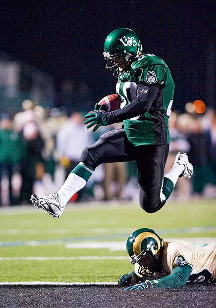 American footballer scoring a touchdown